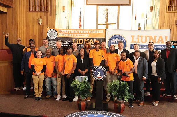 Recent graduates gather Friday for a group photo during the ceremony marking the completion of the city’s first community-based workforce development program, a partnership between the City of Richmond, LIUNA and Kirila Construction Services.