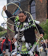 Celebrating sound, spirit and tradition-Thousands of people filled
Brown’s Island and the riverfront for this year’s Richmond Folk Festival, a three-day celebration of music, culture and community. From traditional Appalachian tunes to global rhythms, the event once again brought together artists and audiences from across the world. The annual event is one of the region’s most anticipated weekends. Sampson Sinquah performs a Hopi hoop dance with the Sinquah Family Dancers during the 21st annual Richmond Folk Festival. (Sandra Sellars/Richmond Free Press)