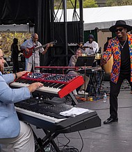 Celebrating sound, spirit and tradition-Thousands of people filled
Brown’s Island and the riverfront for this year’s Richmond Folk Festival, a three-day celebration of music, culture and community. From traditional Appalachian tunes to global rhythms, the event once again brought together artists and audiences from across the world. The annual event is one of the region’s most anticipated weekends. Known for their
hits “Walking in Rhythm” and “Rock Creek Park,” the Blackbyrds perform on Saturday. Formed in the early 1970s at Howard University under the guidance of jazz trumpeter Donald Byrd, the group became known for blending jazz, funk and soul.(Sandra Sellars/Richmond Free Press)