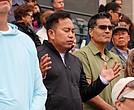 Worshippers reflect during the praise and worship service at Catholic Fest, held Oct. 11 at The Diamond.