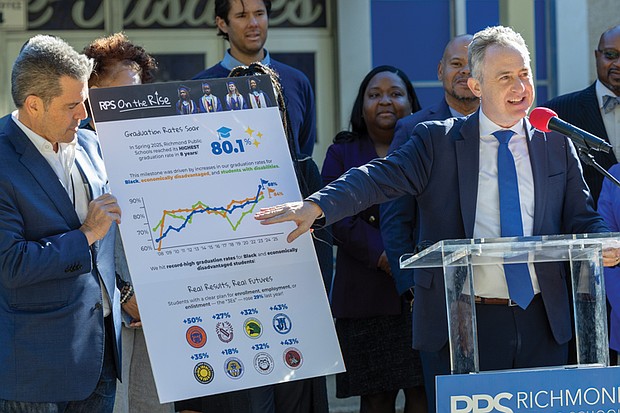 Richmond Public Schools Superintendent Jason Kamras announces districtwide graduation statistics during a news conference Oct. 16 at John Marshall High School. Kamras, School Board members, Principal Monica Murray and students highlighted the district’s record-high graduation rates, including John Marshall’s first-ever 100% graduation rate.