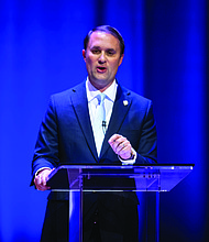 Republican incumbent Jason Miyares participates in the Virginia attorney general debate in Richmond on Oct. 16.