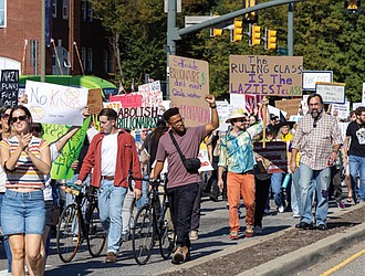 Thousands filled Broad Street for the No Kings demonstration Oct. 18, as part of a nationwide protest against the policies of President Donald Trump’s administration. The rally began with an hour of speeches at the state Capitol, followed by a march to Monroe Park.