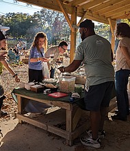 Visitors enjoy food and fellowship during a recent Harvest Festival at Shalom Farms’ Northside location. This year’s celebration is set for Wednesday, Oct. 29.