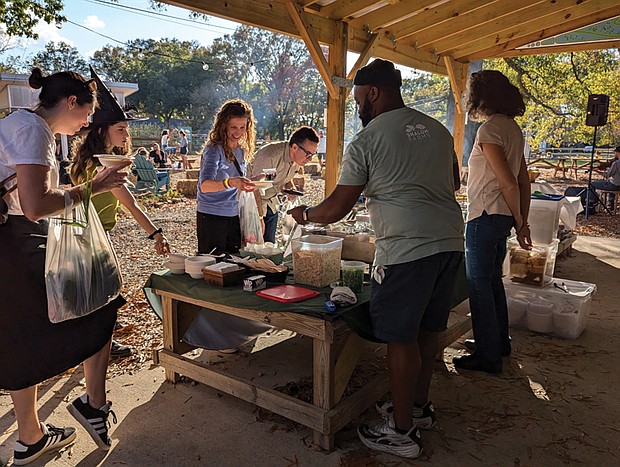 Visitors enjoy food and fellowship during a recent Harvest Festival at Shalom Farms’ Northside location. This year’s celebration is set for Wednesday, Oct. 29.