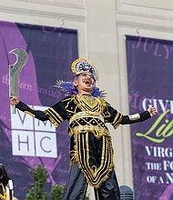 Festival highlights traditional Indian arts and dance-Richmond celebrated Indian culture and traditions at the Diwali Music & Arts Festival on Oct. 18 at the Virginia Museum of History & Culture. The event, hosted in collaboration with The Rith Initiative, featured classical and folk dances, a Ramayan puppet show, a “Drapes of India” fashion show, henna and rangoli stations, and an arts bazaar highlighting local artisans.Tegh Rosha brings Raven, the antagonist from the ancient Indian epic
Ramayana, to life in the Ramayan puppet show. (Julianne Tripp Hillian/Richmond Free Press)