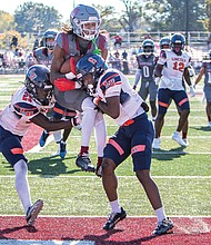 Wide receiver Keon Davis caught five passes for 79 yards and two touchdowns, including a leaping grab in the end zone over two Lincoln
defenders.