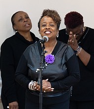 Cedar Street Baptist Church hosts community memorial- The vocal group Serenity performs during the memorial service. A few dozen Richmond residents, many wearing purple or displaying purple flowers or ribbons, filled Cedar Street Baptist Church on Thursday, Oct. 23 for YWCA Richmond’s Remember My Name memorial. The event, held during Domestic Violence Awareness Month, honored those who lost their lives to domestic violence and urged the community to take action to prevent future tragedies. (Julianne Tripp Hillian/Richmond Free Press)