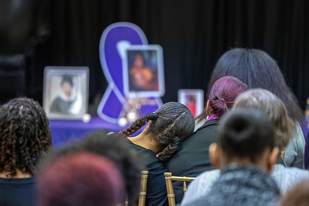 Cedar Street Baptist Church hosts community memorial- A few dozen Richmond residents, many wearing purple or displaying purple flowers or ribbons, filled Cedar Street Baptist Church on Thursday, Oct. 23 for YWCA Richmond’s Remember My Name memorial. The event, held during Domestic Violence Awareness Month, honored those who lost their lives to domestic violence and urged the community to take action to prevent future tragedies. (Julianne Tripp Hillian/Richmond Free Press)