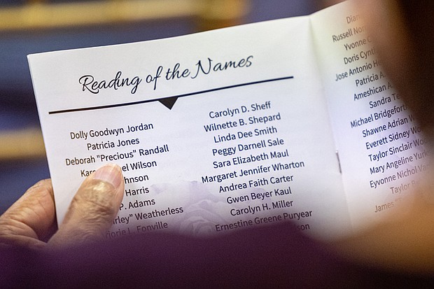 Cedar Street Baptist Church hosts community memorial-About 200 names were read aloud at the church during the memorial. A few dozen Richmond residents, many wearing purple or displaying purple flowers or ribbons, filled Cedar Street Baptist Church on Thursday, Oct. 23 for YWCA Richmond’s Remember My Name memorial. The event, held during Domestic Violence Awareness Month, honored those who lost their lives to domestic violence and urged the community to take action to prevent future tragedies. (Julianne Tripp Hillian/Richmond Free Press)