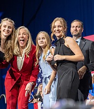 Democrat Abigail Spanberger, the apparent governor-elect of Virginia, celebrates with her family at an election results watch party on Tuesday in Richmond. Photo by Julianne Tripp Hillian