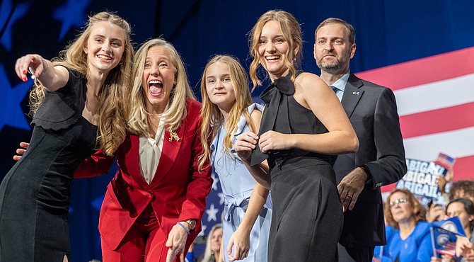 Democrat Abigail Spanberger, the apparent governor-elect of Virginia, celebrates with her family at an election results watch party on Tuesday in Richmond. Photo by Julianne Tripp Hillian