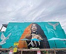 A mural honoring the late rapper and social media influencer Braxton “Brax” Baker is on the side of Da Spot Recording Studio at 213 W. Brookland Park Blvd. The mural, created by Jason Ford, was formally unveiled Saturday, June 5, 2021.