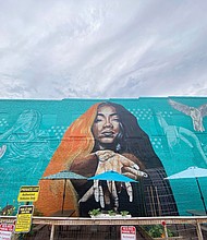 A mural honoring the late rapper and social media influencer Braxton “Brax” Baker is on the side of Da Spot Recording Studio at 213 W. Brookland Park Blvd. The mural, created by Jason Ford, was formally unveiled Saturday, June 5, 2021.