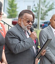 The Rev. Cozy Bailey, president of the NAACP Virginia State Conference, speaks at a 2024 event. The organization filed a federal lawsuit this week, alleging state and local election officials are unlawfully rejecting voter registrations from college students.