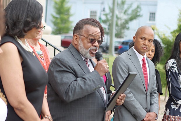 The Rev. Cozy Bailey, president of the NAACP Virginia State Conference, speaks at a 2024 event. The organization filed a federal lawsuit this week, alleging state and local election officials are unlawfully rejecting voter registrations from college students.