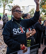 Marcia Pope joined dozens of protesters and the Richmond chapter of the Southern Christian Leadership Conference, along with more than a dozen local civic and social justice groups, for the “United We Stand” march and rally Sunday, Nov. 2.