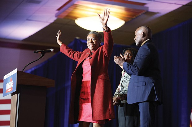 Winsome Earle-Sears, the Republican nominee for Virginia governor, speaks to supporters on election night in Loudoun County on Nov. 4. She was joined on stage by her family. Earle-Sears lost the election to Democrat Abigail Spanberger by nearly 15 points.