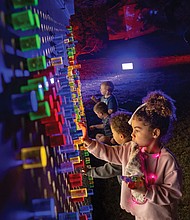 Lights and color transform Maymont for Garden Glow-Garden Glow has returned to Maymont’s gardens nightly, through Nov. 9. A child takes in the colorful light displays in Maymont’s gardens. The annual event features mesmerizing light installations by international artists — some paired with coordinated soundscapes and music — along with the activity filled Glow Village, food and drinks. Opening times and ticket prices vary. Proceeds support the care of Maymont’s gardens, resident animals and historic mansion. (Julianne Tripp Hillian/Richmond Free Press)