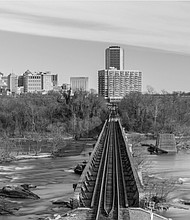 Cityscape Slices of life and scenes in Richmond-“Long Exposure Tracks,” an image showing railroad tracks crossing the James River from Richmond’s floodwall, won the Cities & Towns category in the Scenic Virginia Photo Contest. The photo was taken in January by Richmond resident Katelynd Bab, who moved here in 2022. Bab, who has been photographing for about a decade, said she was drawn to how the image reflected the city’s character through its mix of water, steel and skyline. Scenic Virginia announced contest winners last month across nine categories, from Coastals & Waterways to Farms & Open Spaces. The full gallery of winning images is available at scenicvirginia.org. (photo by Katelynd Bab)