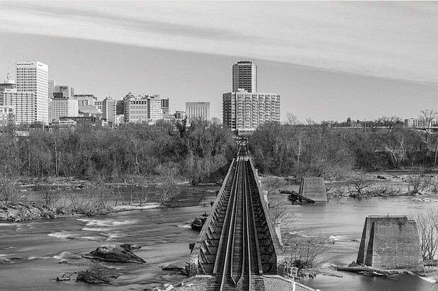 Cityscape Slices of life and scenes in Richmond-“Long Exposure Tracks,” an image showing railroad tracks crossing the James River from Richmond’s floodwall, won the Cities & Towns category in the Scenic Virginia Photo Contest. The photo was taken in January by Richmond resident Katelynd Bab, who moved here in 2022. Bab, who has been photographing for about a decade, said she was drawn to how the image reflected the city’s character through its mix of water, steel and skyline. Scenic Virginia announced contest winners last month across nine categories, from Coastals & Waterways to Farms & Open Spaces. The full gallery of winning images is available at scenicvirginia.org. (photo by Katelynd Bab)