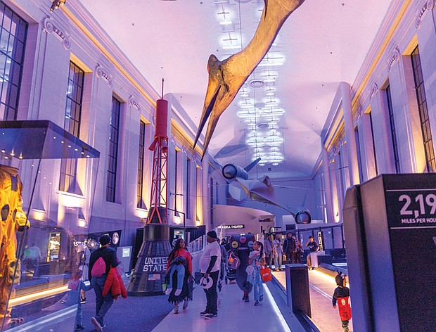 Tricks, treats and togetherness-Families flocked to the Science Museum of Virginia on Halloween for U.S. Rep. Jennifer McClellan’s annual Community Harvest Festival. The museum opened several exhibits
and experiences for children to enjoy
throughout the event. The event, held Friday evening, offered Richmond-area children a safe space to trick-or-treat, enjoy museum exhibits and connect with community resources. Guests explored hands-on experiences in the museum’s Speed, Boost and The Power of Poison exhibits, along with its Animal, Art and Eco Labs. Halloween laser shows and live science demos added to the night’s festivities. (Julianne Tripp Hillian/Richmond Free Press)