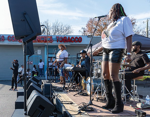 Neighborhood pride shines at Brookland Park Fest-Brookland Park Fest filled the boulevard with music, art and food as residents and visitors gathered Sunday, Nov. 9 for the annual community celebration. The free event, organized by the Brookland Park Business Association, showcased local businesses, artists and food vendors, along with musical performances, family activities and special events hosted by shops along Brookland Park Boulevard between Fendall and North avenues. ShaMecca “Mecca” and LaTeshia “Teshia” LeSane, owners of the Harlym
Blue’Z restaurant in Brookland Park, perform during the festival. (Julianne Tripp Hillian)
