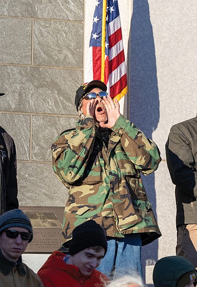 Paying tribute-The ceremonies honored Virginians who have served and those currently serving in the U.S. Armed Forces. Felix H. Shelton, 64, a Marine veteran, chants the Marine battle cry during the 69th Annual Commonwealth’s Veterans Day Ceremony at the Virginia War Memorial on Tuesday, Nov. 11. (Julianne Tripp Hillian/Richmond Free Press)