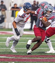 Virginia Union University running back Curtis Allen (0) carries the ball during the Panthers’ 14-3 win over Virginia State University on Saturday, Nov. 8, clinching a spot in the 2025 CIAA Championship Game.