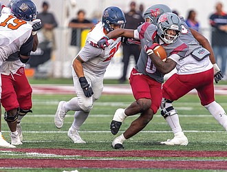 Virginia Union University running back Curtis Allen (0) carries the ball during the Panthers’ 14-3 win over Virginia State University on Saturday, Nov. 8, clinching a spot in the 2025 CIAA Championship Game.