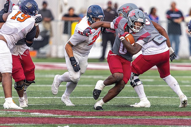 Virginia Union University running back Curtis Allen (0) carries the ball during the Panthers’ 14-3 win over Virginia State University on Saturday, Nov. 8, clinching a spot in the 2025 CIAA Championship Game.
