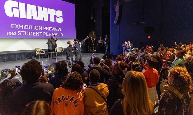 ‘Giants’ excitement-Alicia Keys and Swizz Beatz were welcomed by cheering Richmond-area high school and
college students during a pep rally for the “Giants” exhibition at the Virginia Museum of Fine Arts on Wednesday, Nov. 19. The couple were greeted to the stage by the All-City RPS Drum Line and answered questions about their careers as musical artists. (Julianne Tripp Hillian/Richmond Free Press)