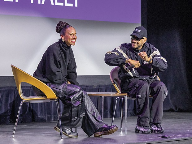 Alicia Keys and Swizz Beatz showcase culture and art-Alicia Keys and Swizz Beatz take the stage at the Virginia Museum of Fine Arts on Wednesday, Nov. 19, for a pep rally for their “Giants” art exhibition with Richmond-area high school and college students. They were welcomed by the All-City RPS Drum Line and answered questions about their careers. Students also viewed the exhibition, featuring art from the couple’s collection. (Julianne Tripp Hillian/Richmond Free Press)