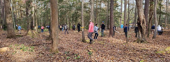 Volunteers from across Lancaster County gathered Nov. 15 in Kilmarnock to help reclaim Old St. John’s Cemetery, a long-neglected African …