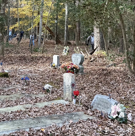 Volunteers from area churches and organizations help reclaim Old St. John’s Cemetery in Kilmarnock during a Nov. 15 cleanup.