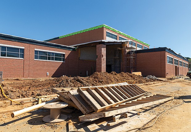 The new Richmond High School for the Arts is shown under construction in August. The $140 million campus off Midlothian Turnpike is designed
to serve about 1,800 students and will include facilities for dance, music, video production and other programs. Completion is expected in winter 2026.