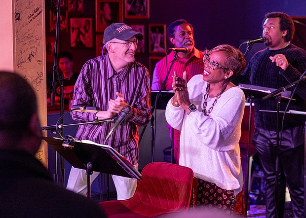 Songs of Truth’ “Songs of Truth: An American Musical Resurrection,” featuring Desirée Roots as Sojourner Truth, was performed Saturday, Nov. 15, and Tuesday, Nov. 18, at Révéler in Carytown. The two performances featured original songs from a musical theater project and inspired by the life of Sojourner Truth. Roots and fellow cast members Kimberly Fox Knight, Wendy Miller, Wanda Fox Miller, Dale Heiskill, Milani Hopkins, Cat Johnson and Sir Rome were accompanied by a band led by Weldon Hill, bringing the abolitionist’s story to life through a fusion of gospel, blues, jazz and Americana. Sojourner Truth’s sixth-generation great-granddaughter Barbara Allen, attended the performances. DKeni B. Fine, creator of Songs of Truth, and Desirée Roots, portraying Sojourner
Truth, dance on stage while Sir Rome, right, and Dale Heiskill, left, provide vocals. (Photos by Julianne Tripp Hillian/Richmond Free Press)