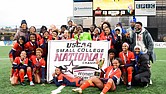 Virginia State women’s soccer players celebrate on the field after their 1–0 win over Shaw University to claim the USCAA Division I national championship.