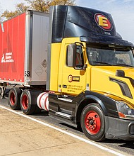 Driving home diabetes awareness-A brightly wrapped Estes Express Lines trailer, designed to raise awareness about diabetes, was parked outside Reynolds Community College’s Parham Road Campus as attendees arrived for the American Diabetes Association’s State of Diabetes: Central Virginia on World Diabetes Day, Nov. 14. Inside, employers, health care professionals and community members discussed the impact of diabetes and obesity and strategies for prevention and care. (Julianne Tripp Hillian/Richmond Free Press)