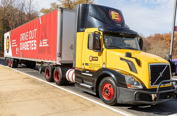 Driving home diabetes awareness-A brightly wrapped Estes Express Lines trailer, designed to raise awareness about diabetes, was parked outside Reynolds Community College’s Parham Road Campus as attendees arrived for the American Diabetes Association’s State of Diabetes: Central Virginia on World Diabetes Day, Nov. 14. Inside, employers, health care professionals and community members discussed the impact of diabetes and obesity and strategies for prevention and care. (Julianne Tripp Hillian/Richmond Free Press)