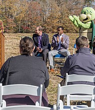 Cityscape Slices of life and scenes in Richmond-Duron Chavis, executive director of Happily Natural Day, speaks during the announcement of a new Henrico community farm at the Runnymeade property off Willis Church Road on Monday, Nov. 17, as Stewart, the mascot of Henrico’s Environmental Action Resource Team, looks on. Seated are John Zannino, Henrico Division of Recreation and Parks director; Tyrone Nelson, Varina District supervisor; Stewart; Roscoe D. Cooper III, Fairfield District supervisor; and John Vithoulkas, Henrico County manager. The farm will begin with 10 acres in a pilot phase managed by the nonprofit, with potential to expand based on community interest. Farmers may apply for quarter- or half-acre plots in late fall.