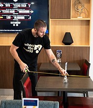 Wheel the World mapper takes a photo of a Holiday Inn Express & Suites Lake Charles hotel room for his records./Photo Courtesy of: Kathryn Shea Duncan