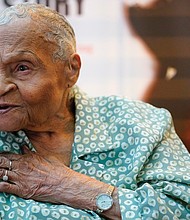 Tulsa Race Massacre survivor Viola Ford Fletcher gestures while speaking during a 2023 interview.
