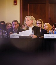 Gov.-elect Abigail Spanberger looks on as a new chart appears on the projector as she follows along with Sen. Ryan McDougle, R-Hanover, and Sen. Louise Lucas, D-Portsmouth, chair of the Senate Finance and Appropriations Committee, during the committee’s annual retreat on Nov. 20 at Kyle Hall on the campus of Radford University.