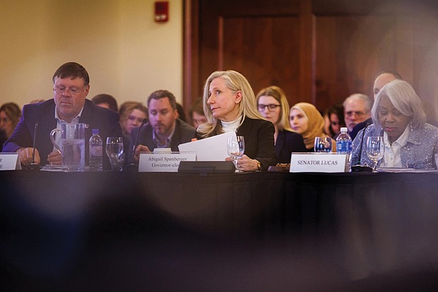 Gov.-elect Abigail Spanberger looks on as a new chart appears on the projector as she follows along with Sen. Ryan McDougle, R-Hanover, and Sen. Louise Lucas, D-Portsmouth, chair of the Senate Finance and Appropriations Committee, during the committee’s annual retreat on Nov. 20 at Kyle Hall on the campus of Radford University.