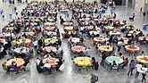 Guests gather for a community meal during The Giving Heart’s Thanksgiving Day Feast at the Greater Richmond Convention Center in 2019. The Richmond nonprofit will host its 20th annual feast on Thursday, offering free meals, flu shots and essential items from 10 a.m. to 2 p.m.
