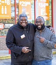 Tony Williams, left, and William Minor stand outside the AutoZone on Hull Street, where Williams works, on Nov. 13. The two recently reconnected at
the store decades after Williams helped Minor at the scene of a car crash — an act Minor says likely saved his life.