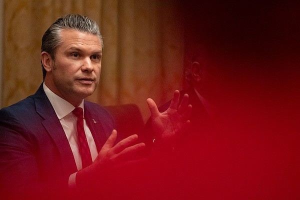 Defense Secretary Pete Hegseth speaks in front of President Donald Trump during a cabinet meeting at the White House in Washington, DC on December 2, 2025.