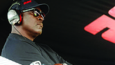 Michael Jordan, co-owner of 23XI Racing, sits in his pit box during a NASCAR Cup Series auto race at Talladega Superspeedway in Talladega, Ala., on Oct. 6, 2024.