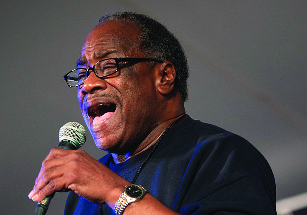 Ric Jennings, a member of the Brotherhood Singers, an African American a cappella gospel quartet from Covington, Ky., performs at the Folk Festival in 2021.